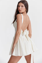 Celestial Grace: The White Bow Dress